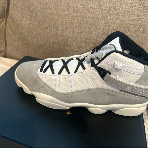 - Jordan Gray and White Sneakers with Cushioned Midsole